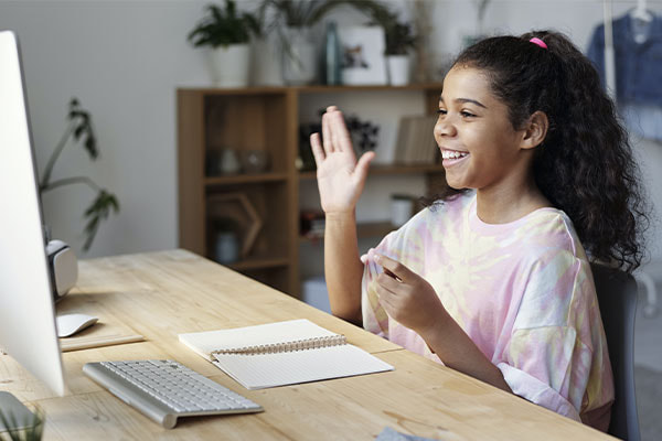 Photo of a girl on an online ADHD and autism testing session. This represents how both children and adults can find answers and uncover the underlying causes of persistent challenges.
