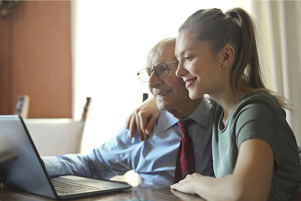 Photo of a grandfather and granddaughter looking for online neuropsychological testing in Texas. This represents how a neuropsychologist can give insightful recommendations for treatment and management.